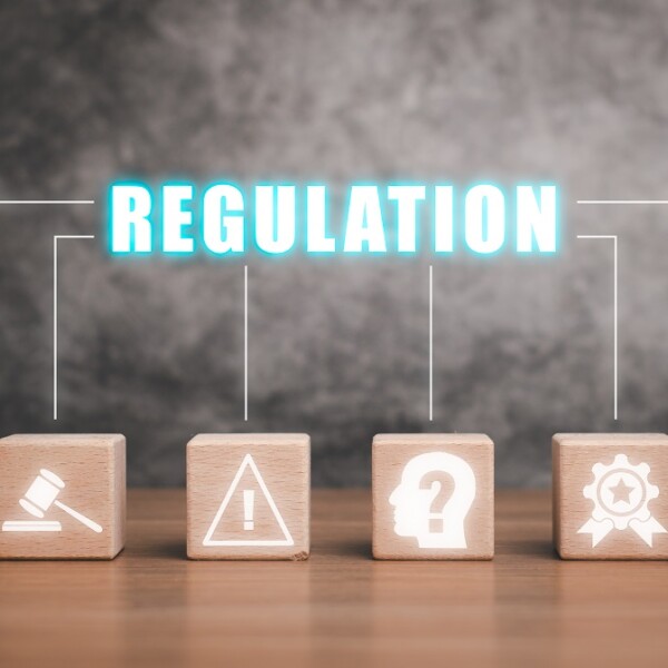 How does the IECEx help national regulatory frameworks?